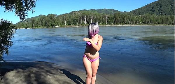  Lesbians rest and fuck on the river bank. Girlfriend with a hairy pussy in a swimsuit doggystyle shakes a big butt. POV Outdoors.